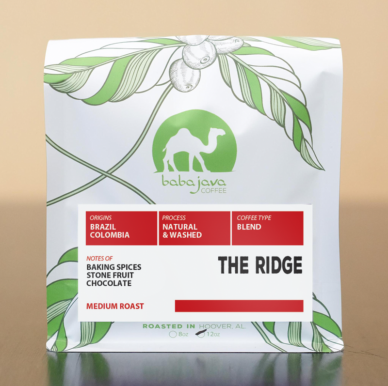 Babajava Coffee package with green and white design on a beige background. This is the Ridge Blend.