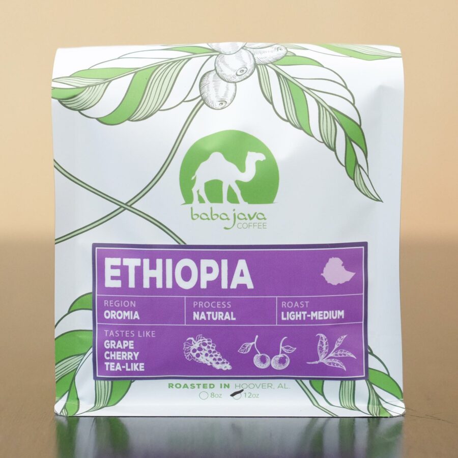 A bag of coffee with a purple label that reads Ethiopia. The bag has a drawing of a coffee plant and the Baba Java Coffee logo.