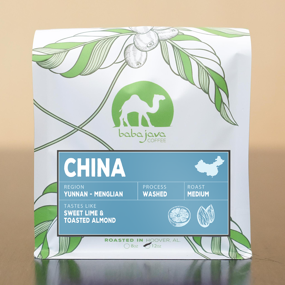 A bag of coffee with a light blue label that reads China. The bag has a drawing of a coffee plant and the Baba Java Coffee logo.